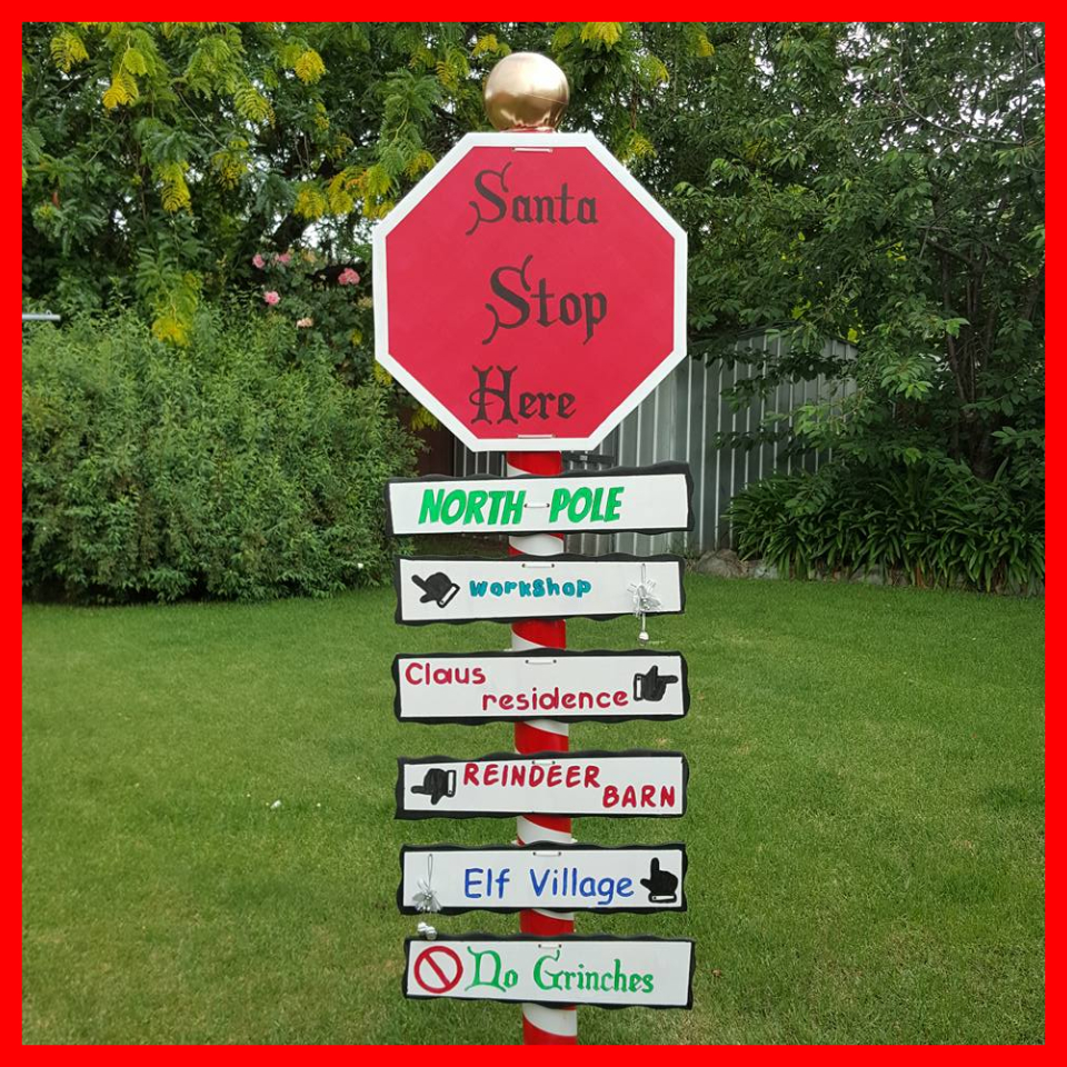 santa-stop-here-sign-post.jpg