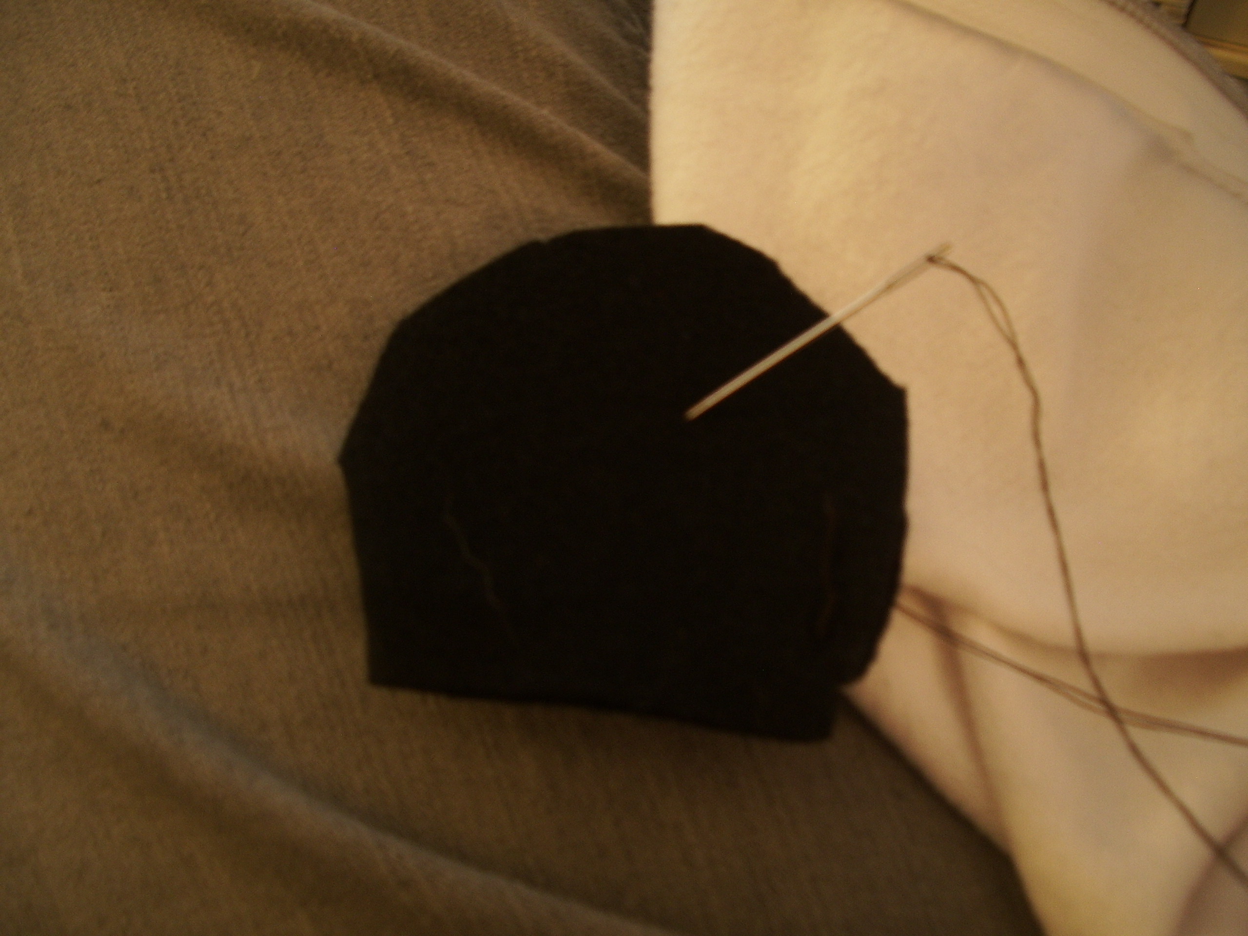 sewing the ear.JPG