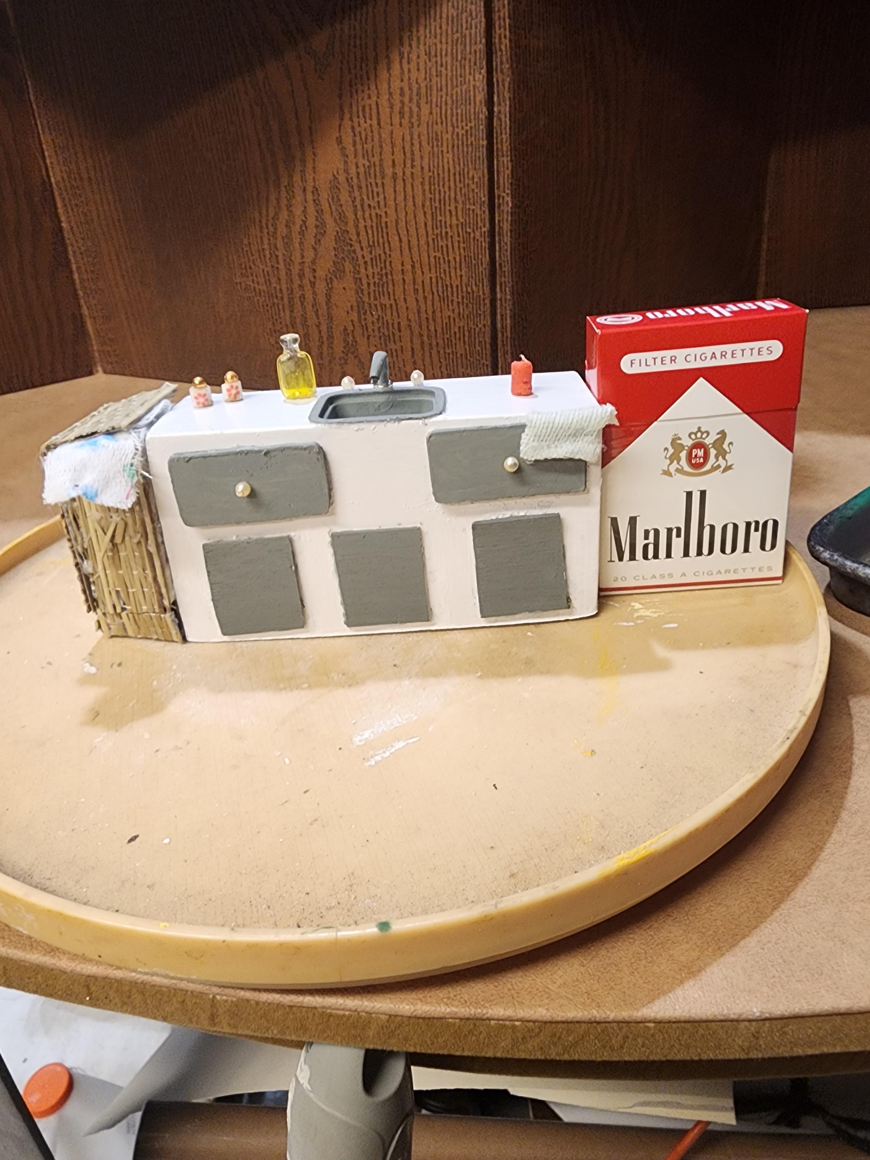 sink compared cig box.jpeg