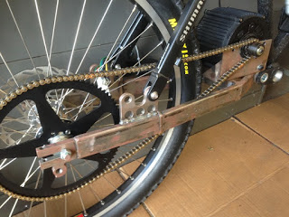 sprocket bolted onto hub with two disc mounts.JPG