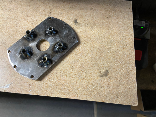 sprocket stand off rivits welded.png