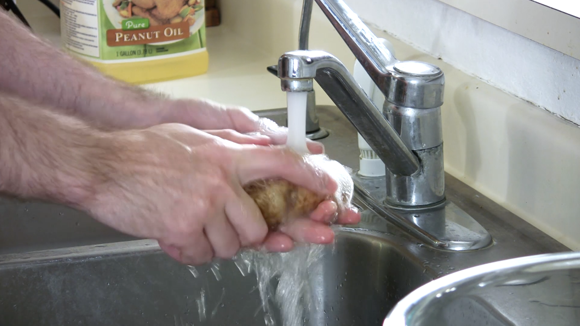 step 1 wash the potatoes.png