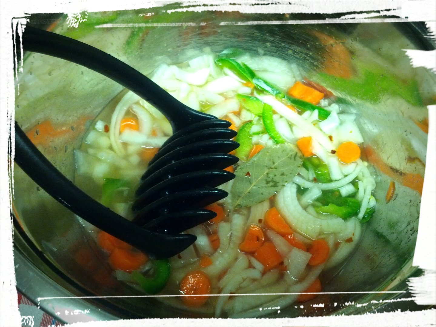 stirring the veggies with the pickling juice.jpg