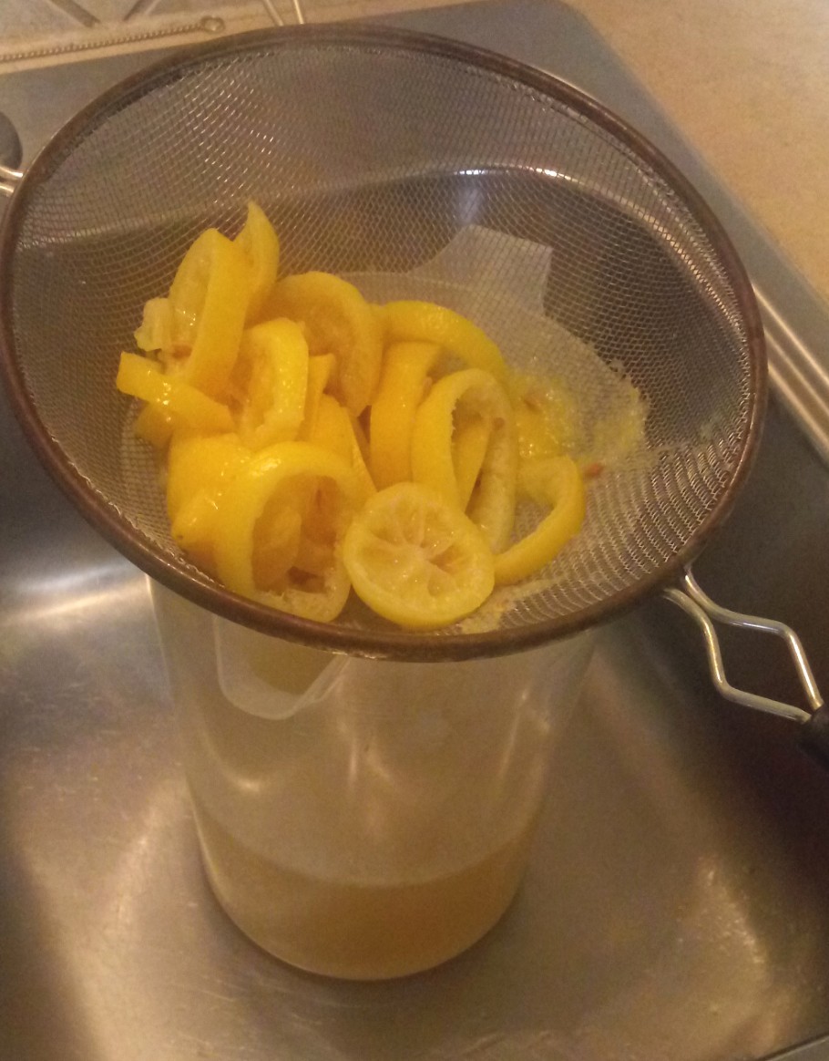 straining lemons.jpg