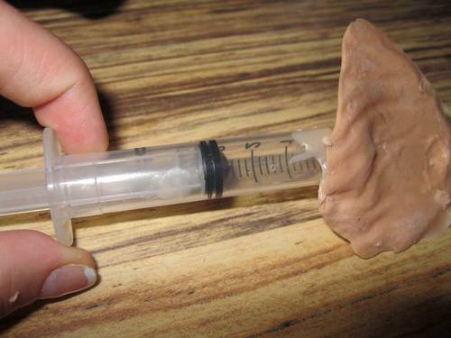 syringe with hole.jpg