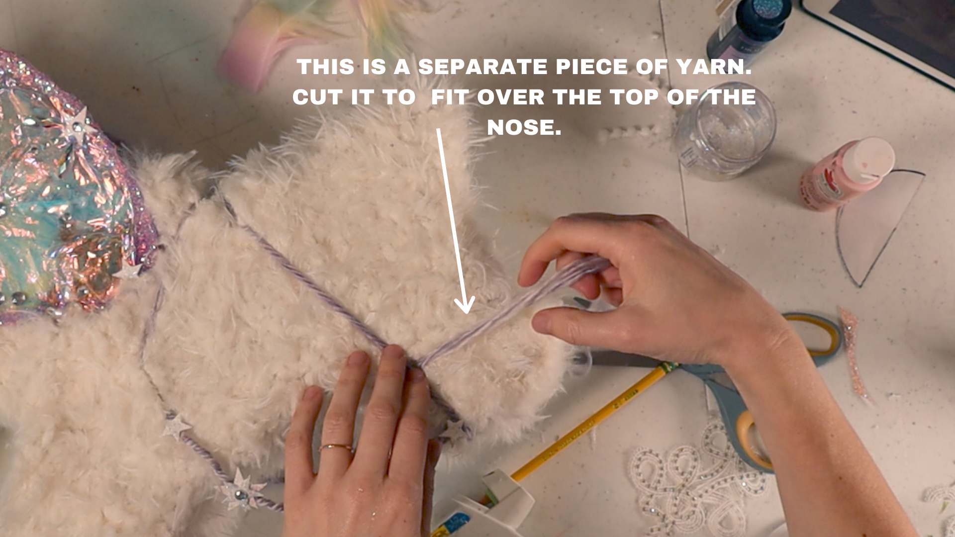 tHIS IS A SEPARATE PIECE OF YARN - CUT IT TO FIT OVER THE TOP OF THE NOSE.png