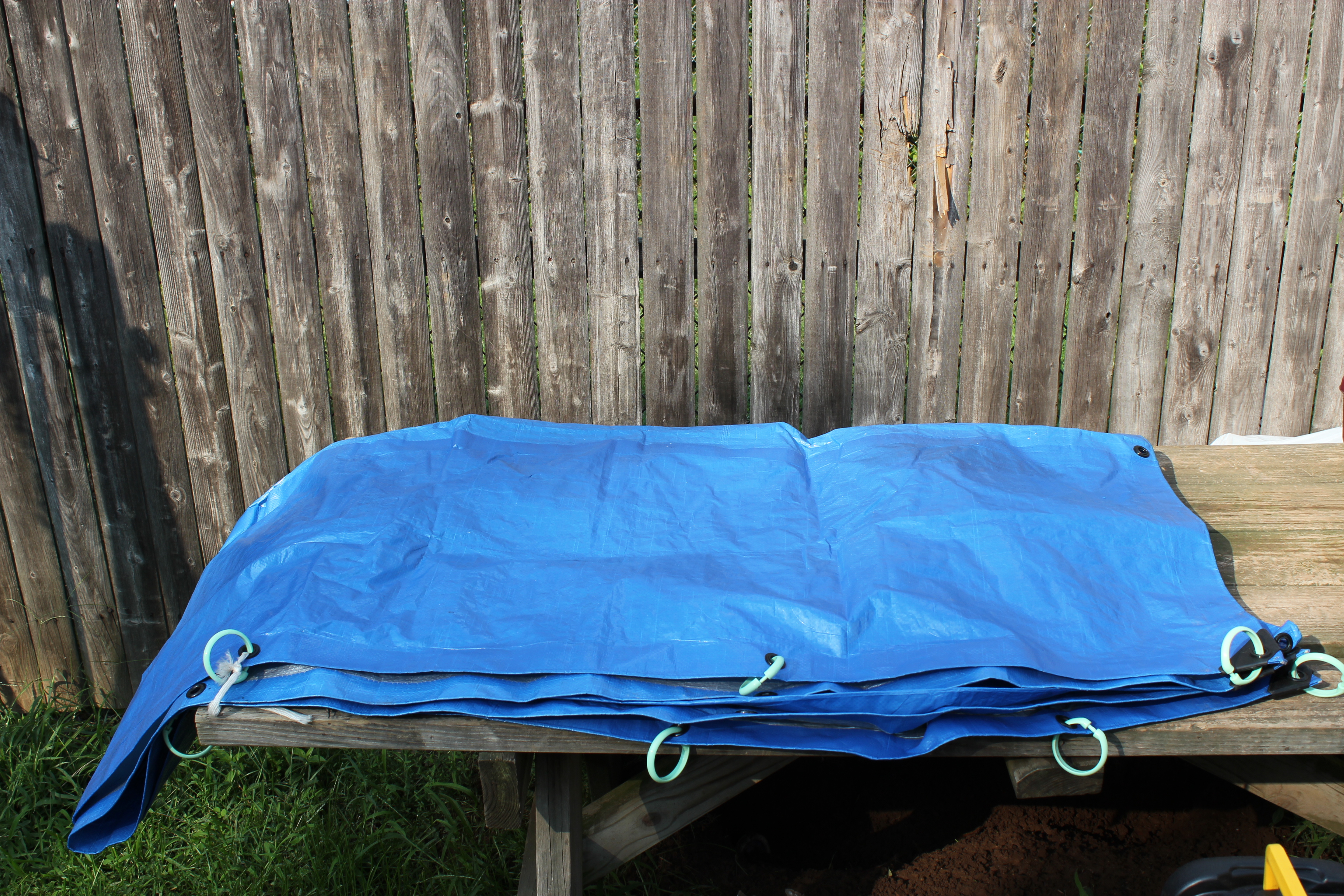 tarp with shower rings attached.JPG