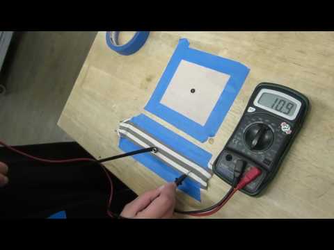 testing 3D printed conductive snaps with a multimeter