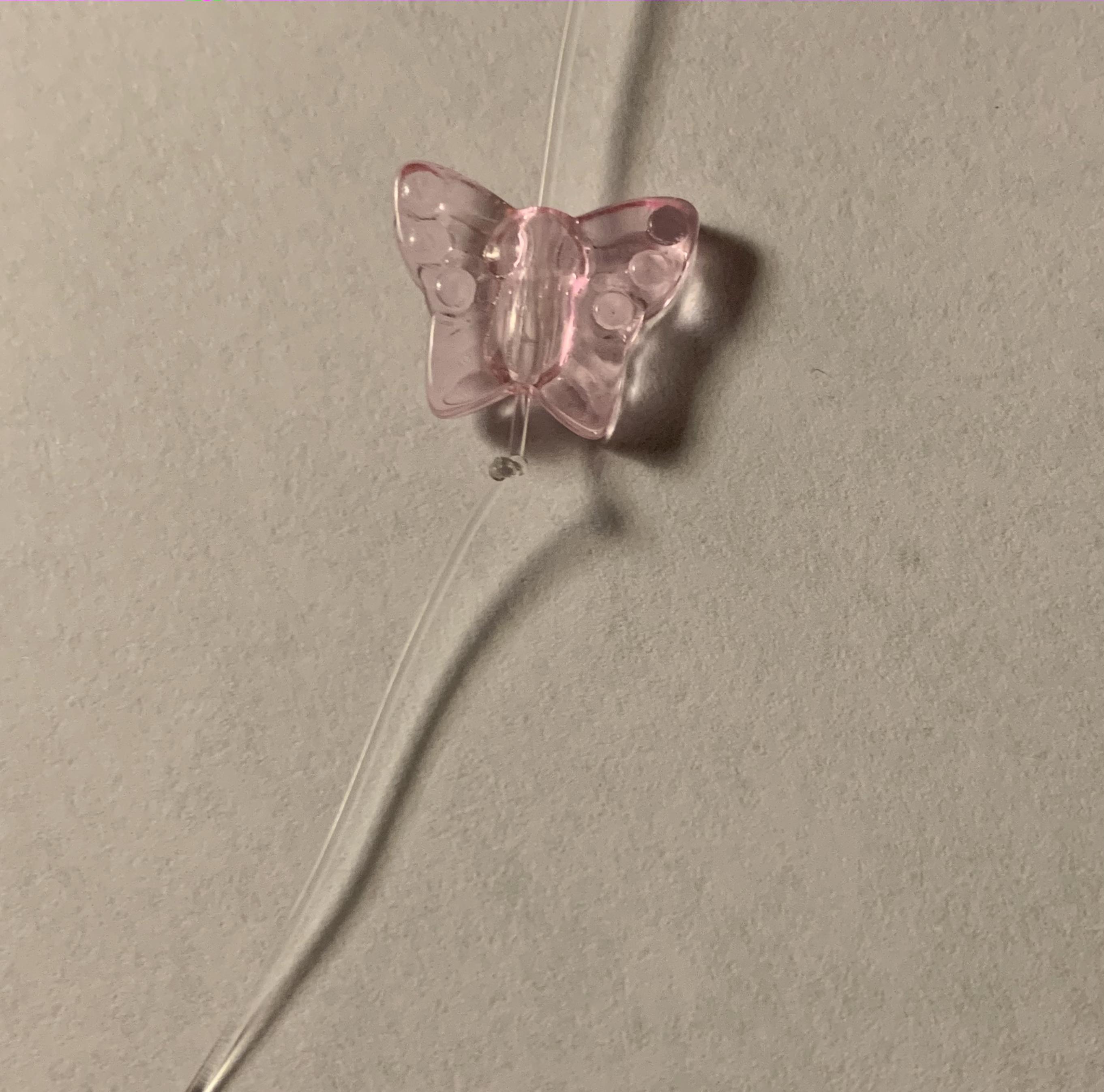 tie a knot under the first bead.jpg