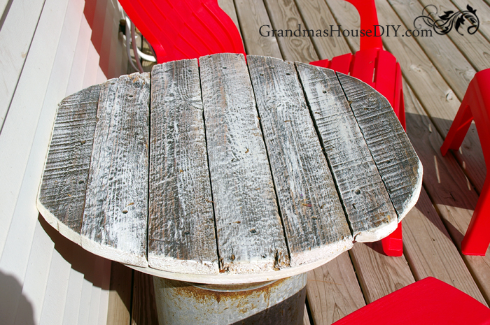 top-barn-wood-table-outside-milk-can.jpg