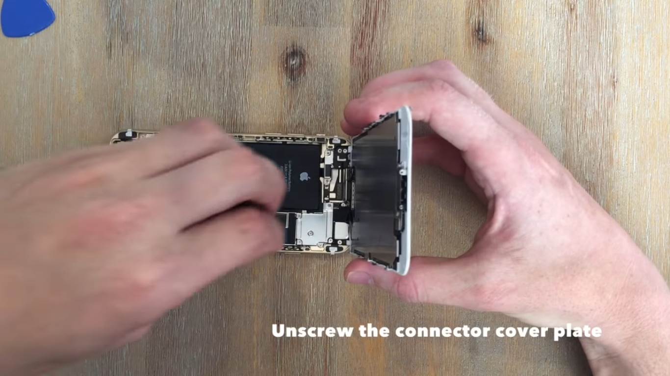 unscrew the connector cover plate.jpg