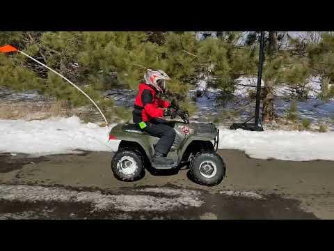 yard fun with Polaris Outlaw and kids Sportsman EV electric quad conversion built by Patrick Basten