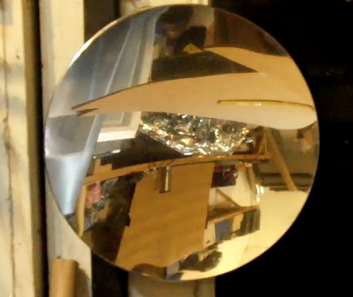 DIY PARABOLIC MIRROR from a trash can lid.