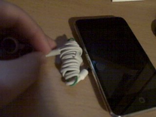 Easy Earbud storage/wrapper using paperclip