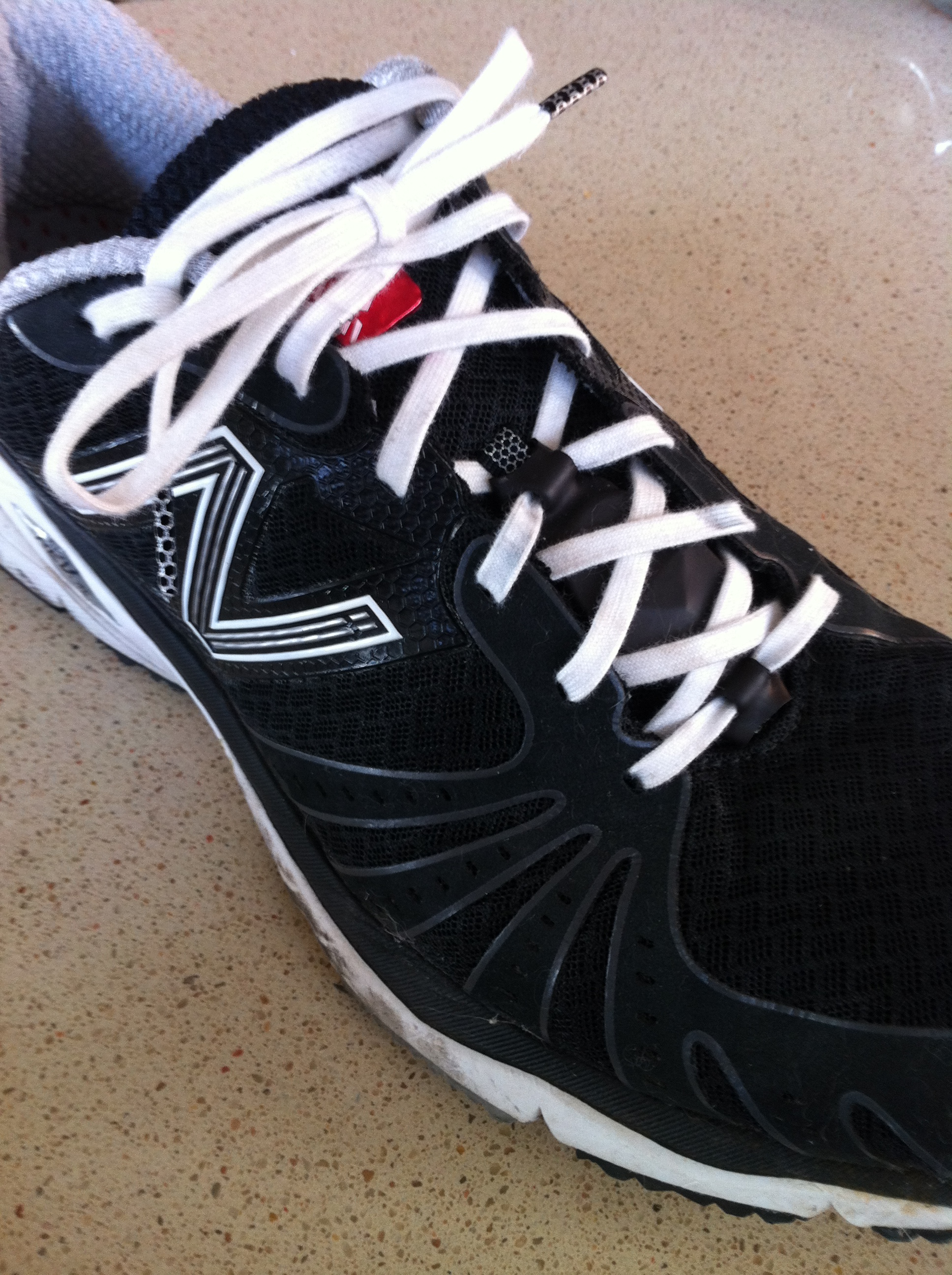 Nike + Plus sensor holder