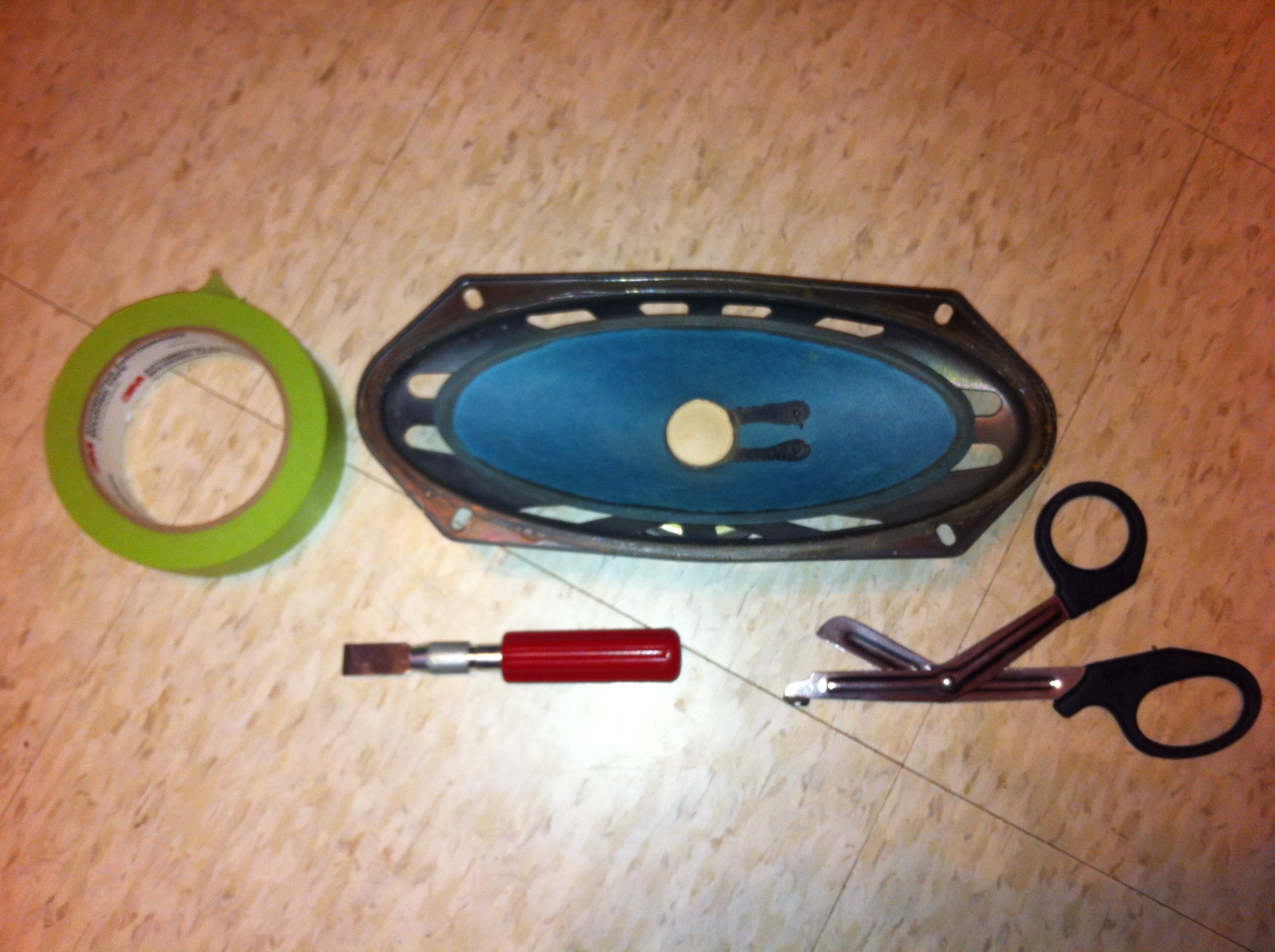 Fix car speakers with masking tape