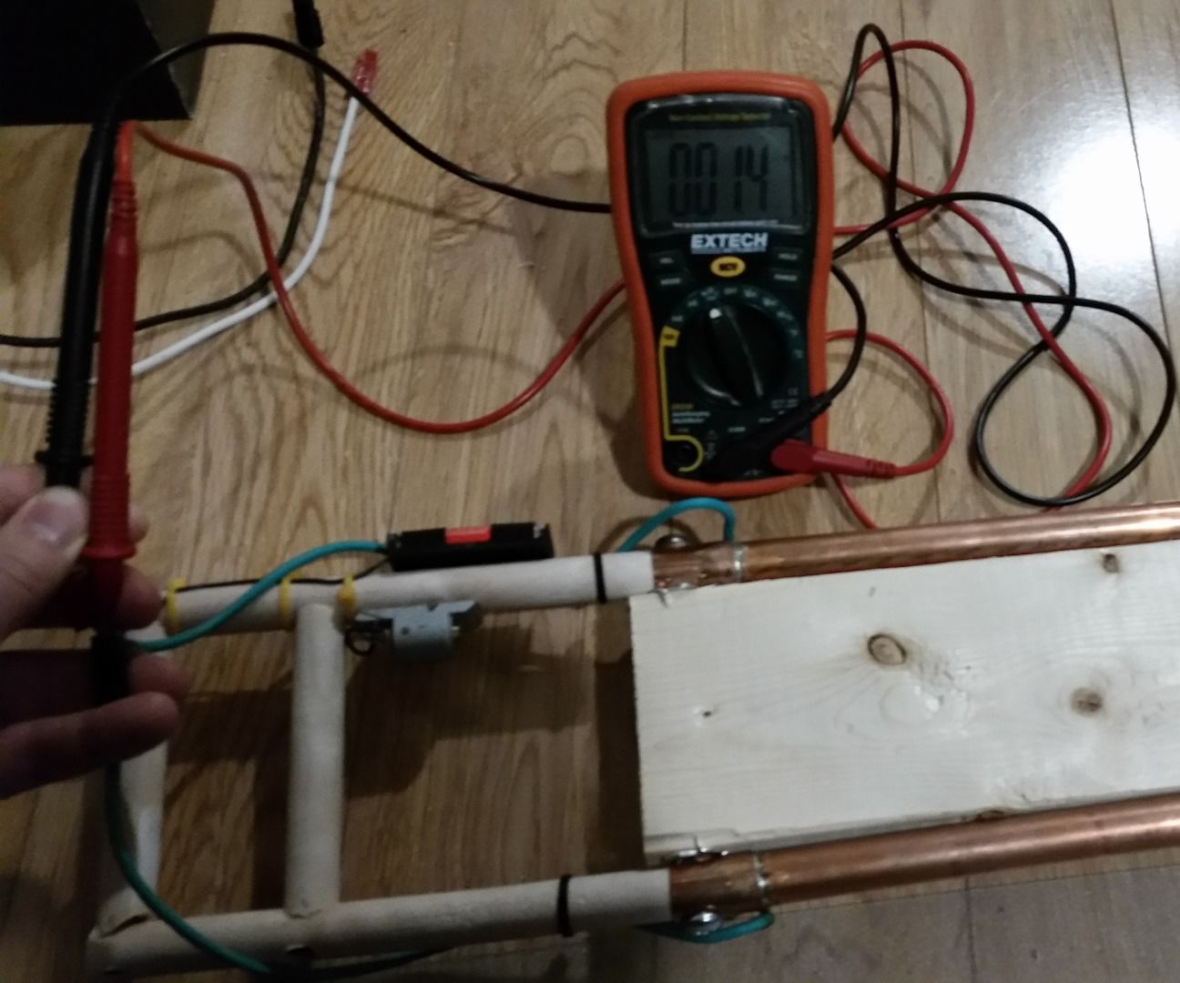 Adjustable height foam block cutter with laser height guide