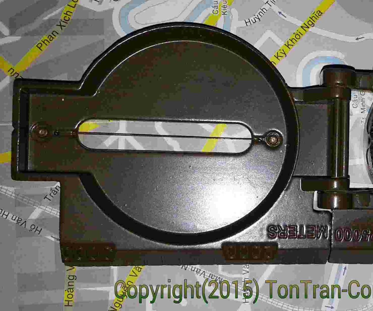 Reshaping the plastic lense of a cheap compass