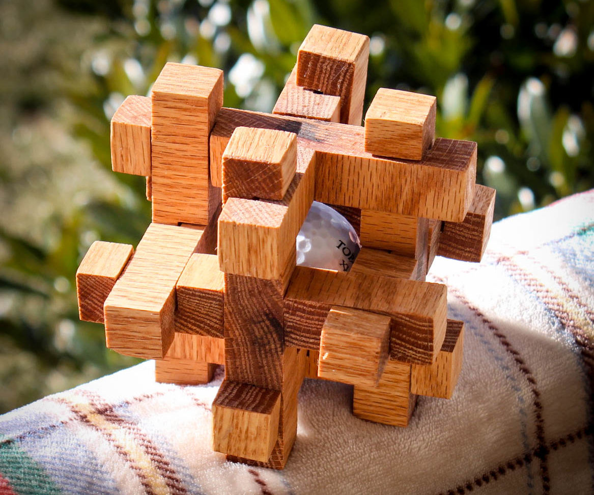 Caged Golf Ball Puzzle