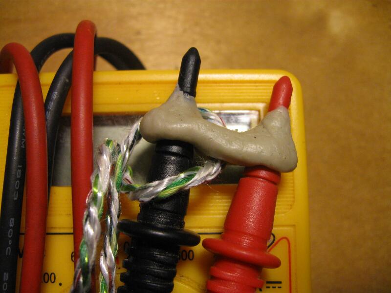 Keep multimeter probe caps from going lost