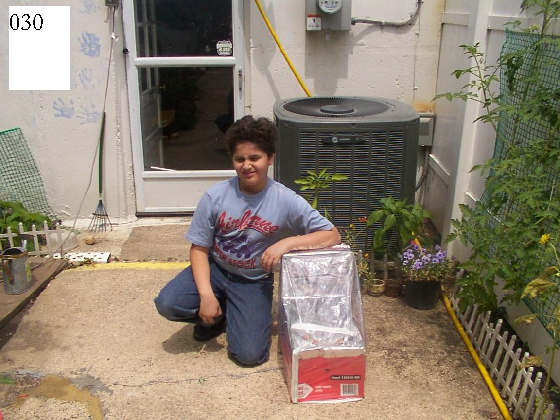 DIY Solar Food Heater made from reused materials.