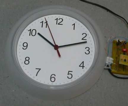 Playing With Hand Wall Clock
