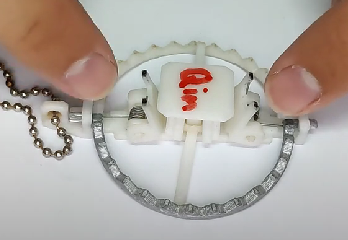 Working Finger Trap Keychain