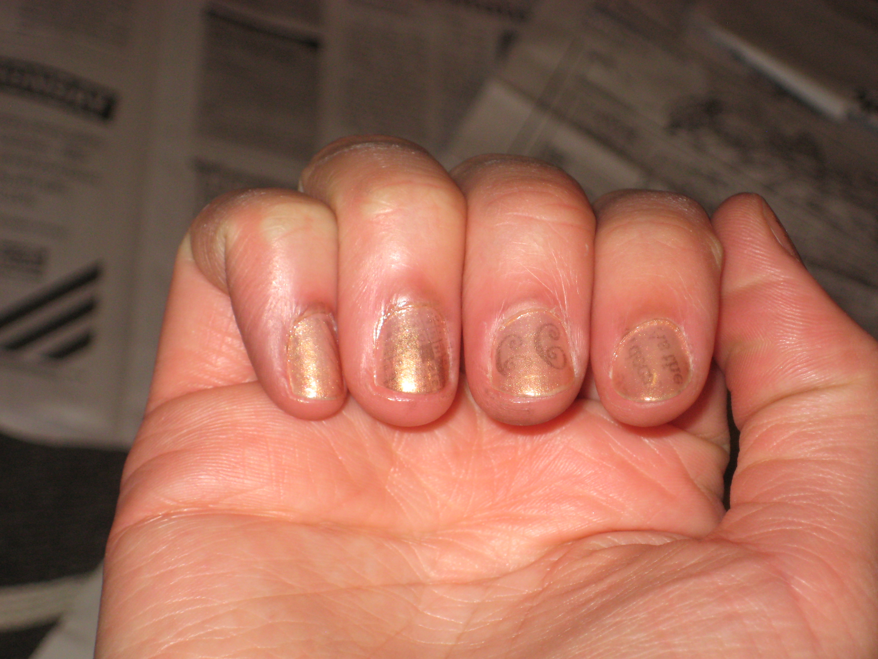 How to Put Newsprint on Nails