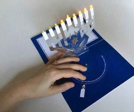 Pop-up, light-up, flat-pack Menorah card