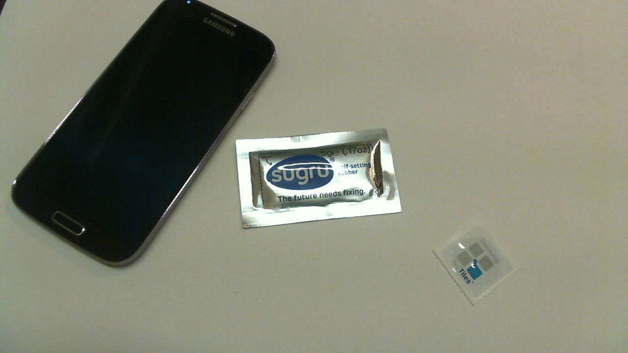 Desk phone stand with Sugru and Samsung TecTiles