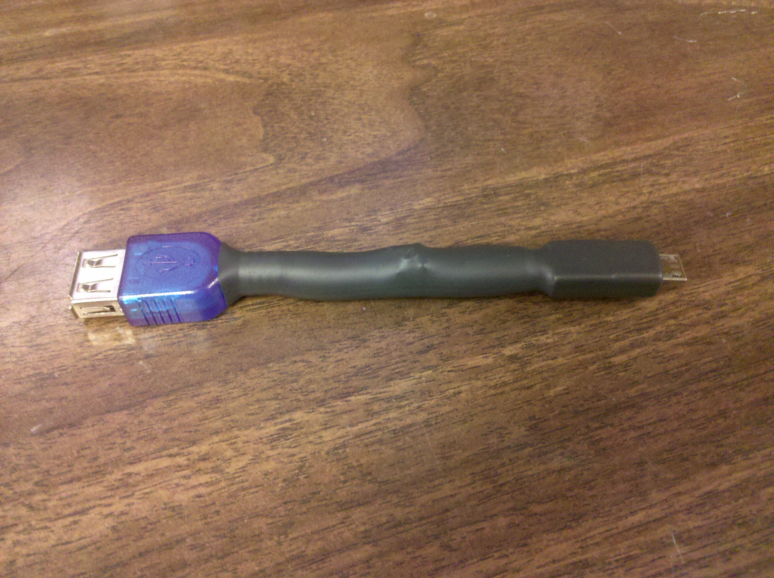 Moto Droid charging and peripheral cable