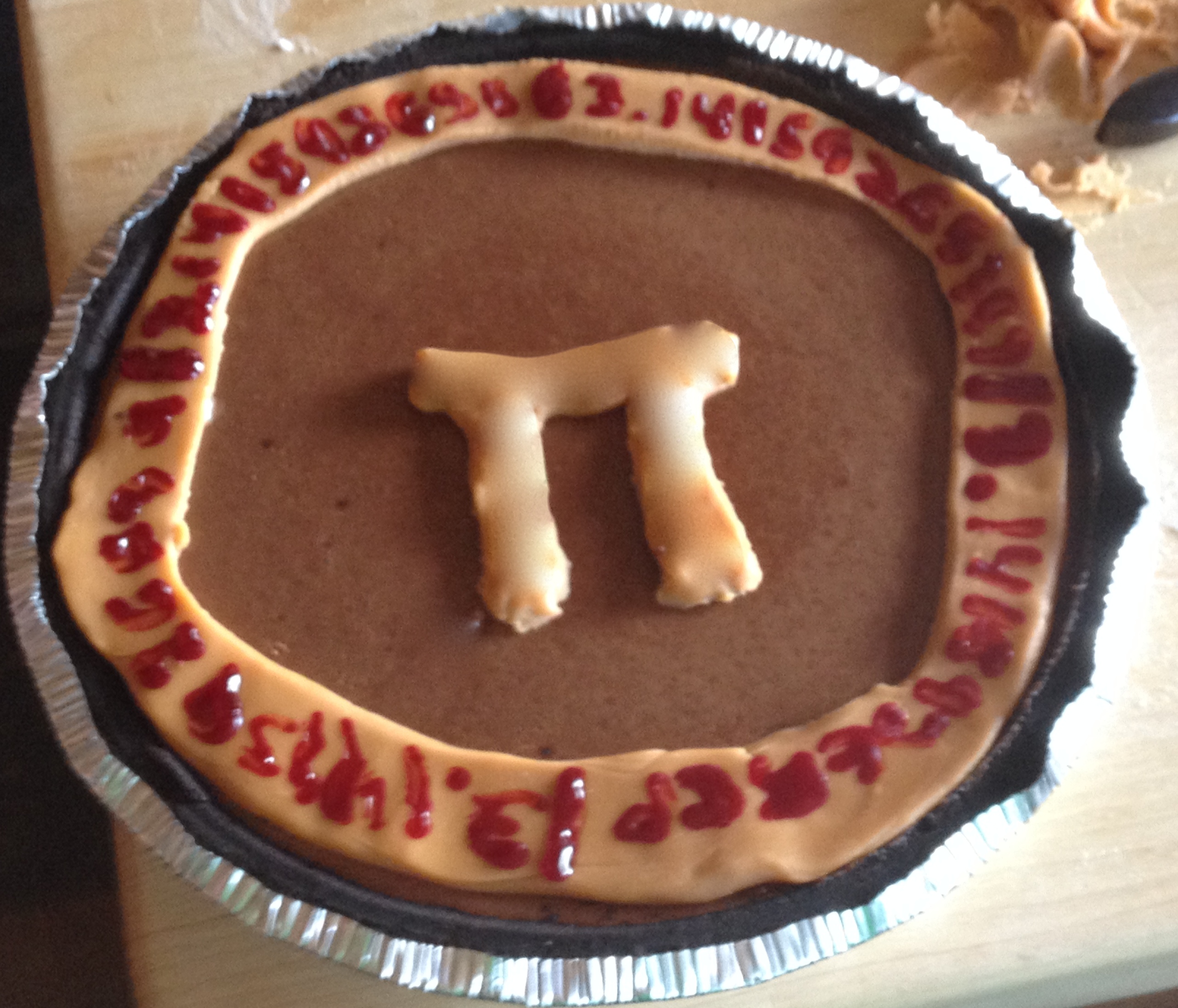 Chocolate Caramel Pie With Pi on top