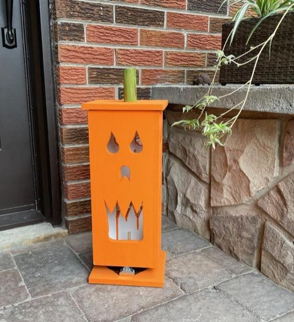 FOUR SIDED ROTATING JACK-O-LANTERN