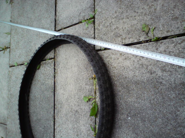 Armouring a Bicycle Tire for Final Puncture Protection.