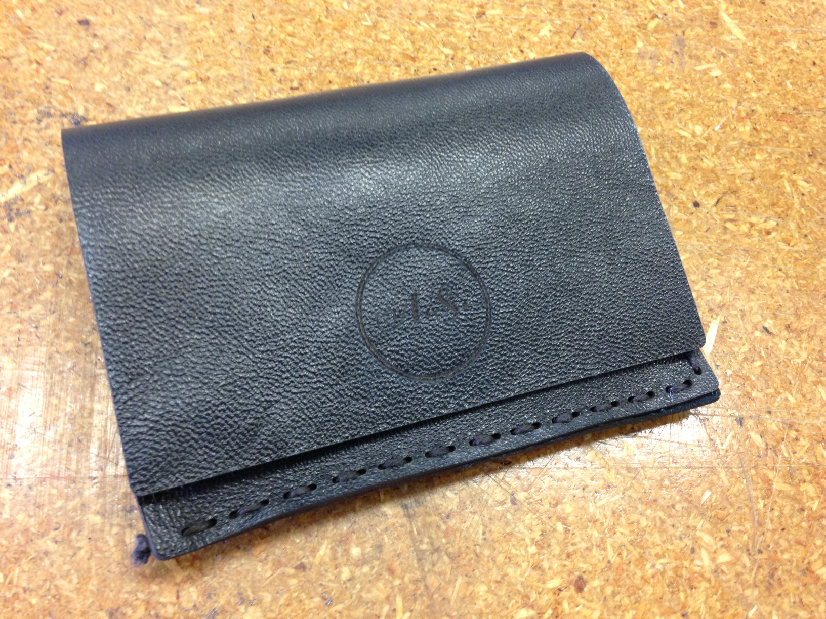 Making a Simple Folded Leather Wallet With Engraved Insignia