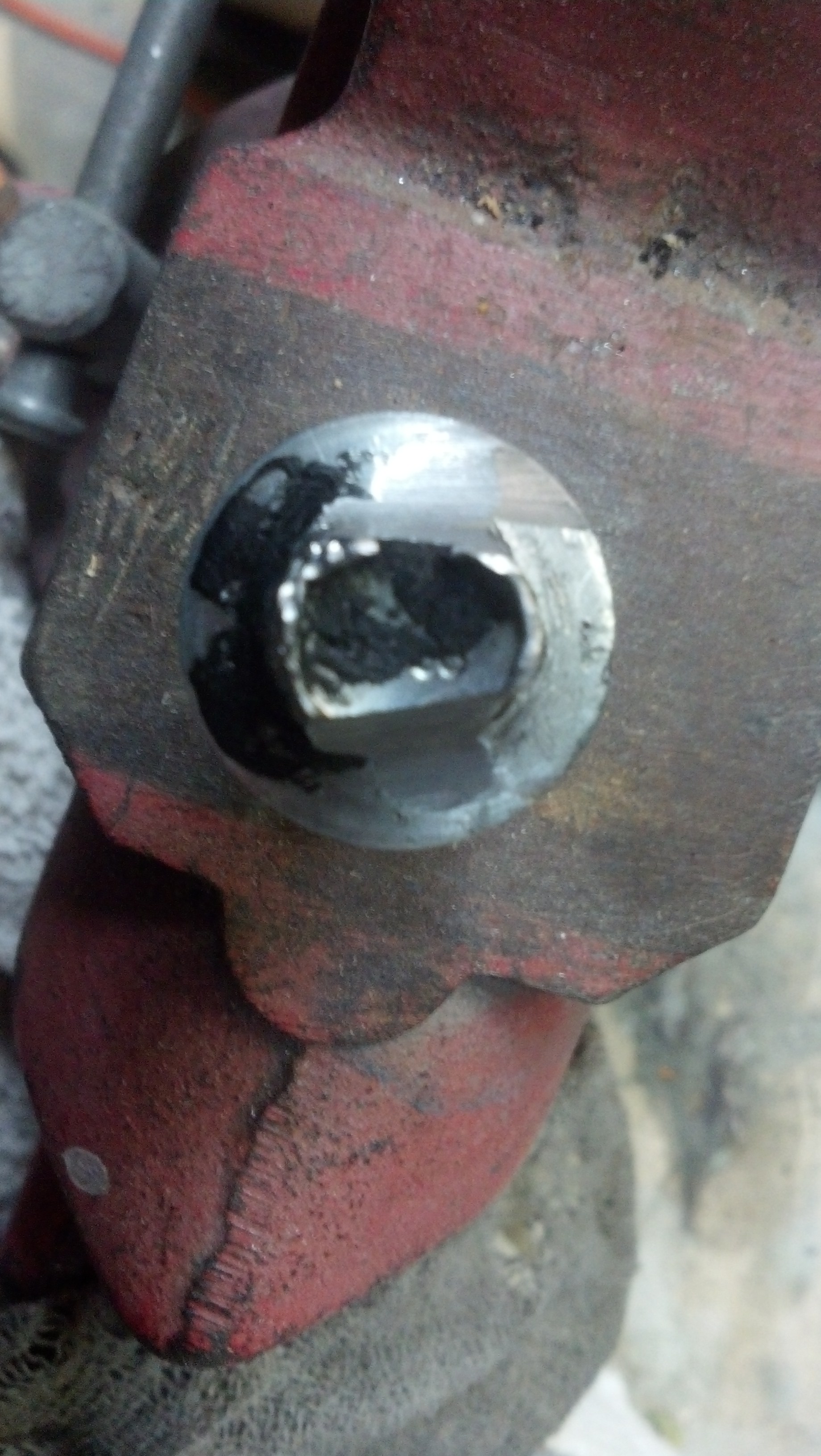 Removing a Bolt With a Rounded Head