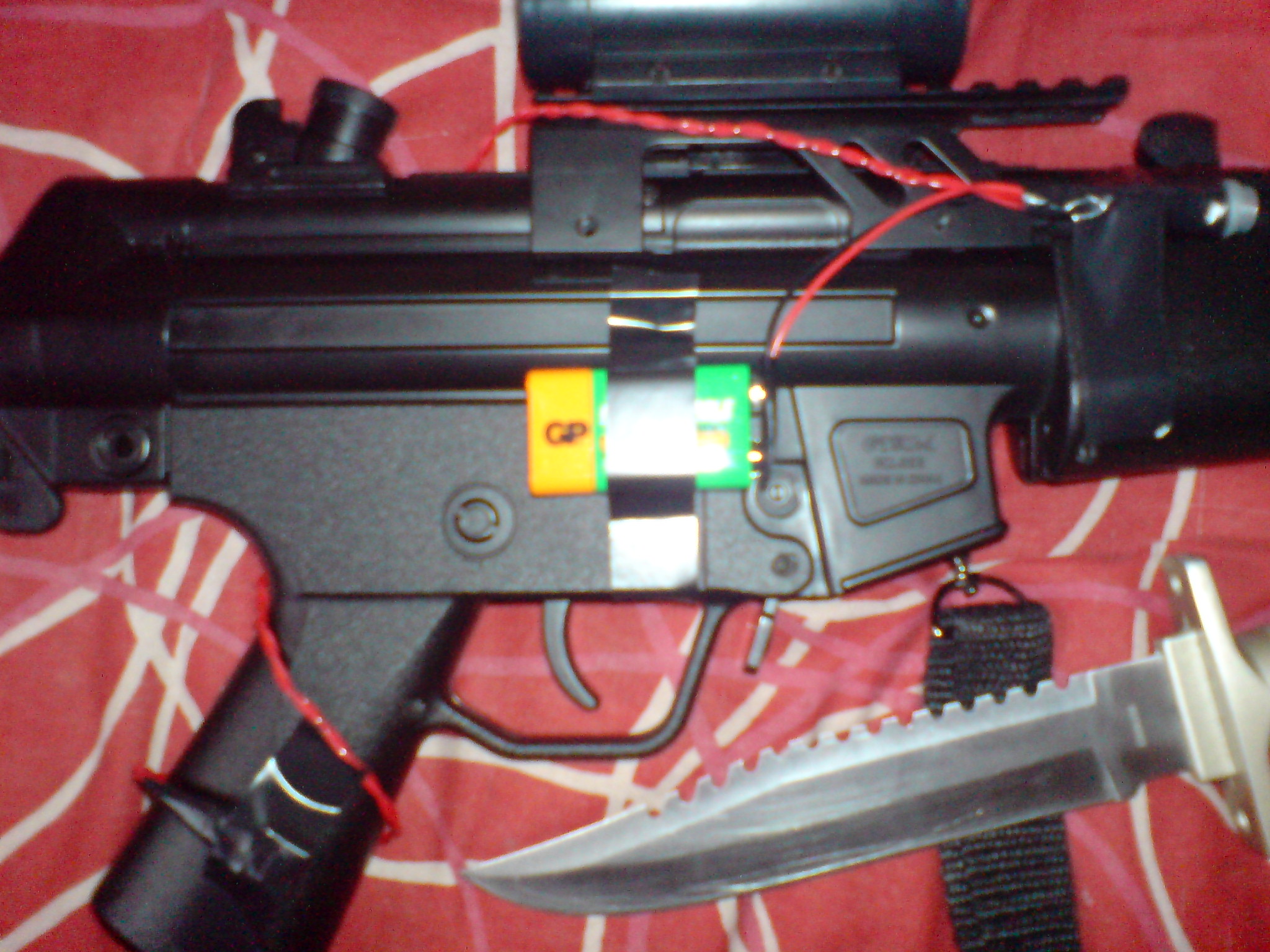Add a laser sight to your airsoft/air rifle.