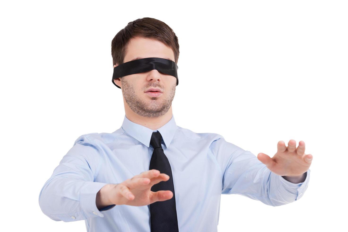 see-no-opportunity-young-businessman-in-blindfold-stretching-out-hands-while-standing-isolated-on-white-free-photo.jpeg