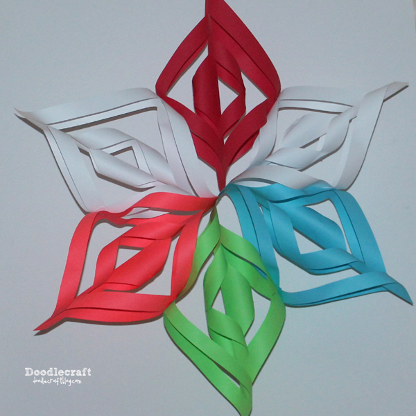 paper chains and decorating for Christmas with paper craft 3d snowflakes how to cut and hang (2).JPG