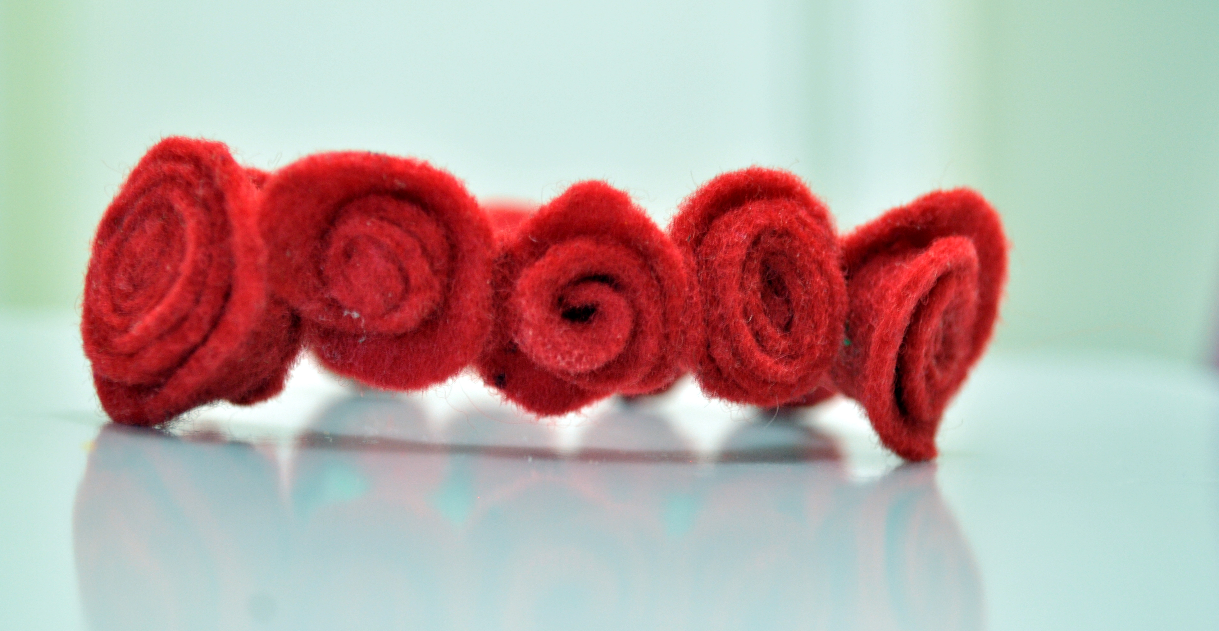 Red Rose bracelets - 27 cents