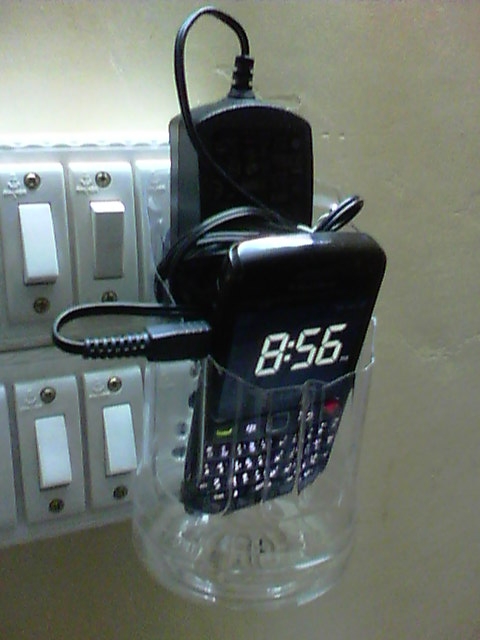 Pet bottle phone charging dock