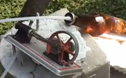 Steam Engine from the sun with a beer bottle