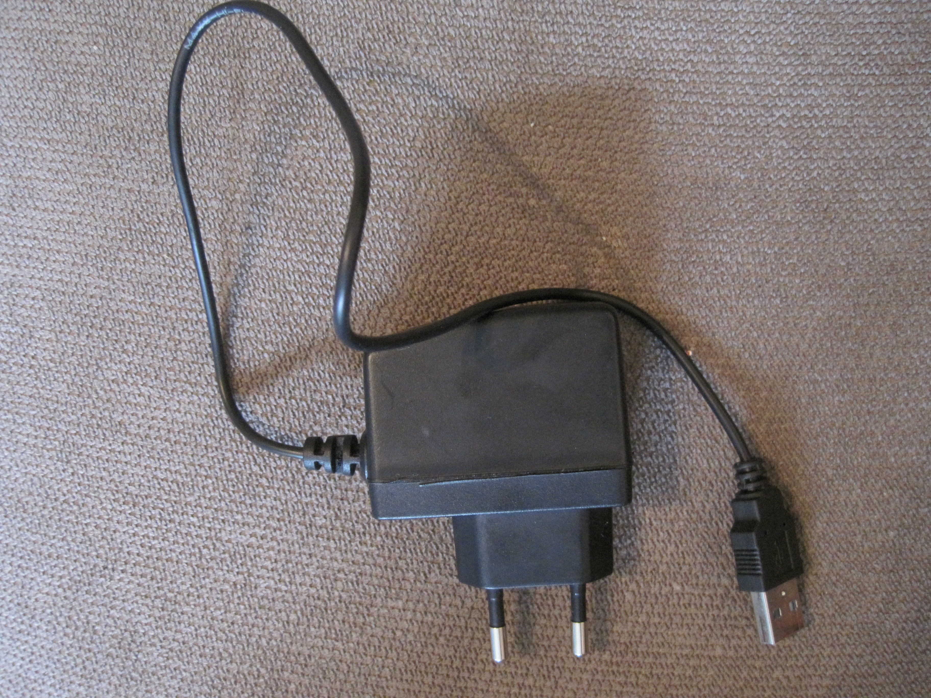 Usb flash memory in wall adapter. "It's a USB data-safe!"