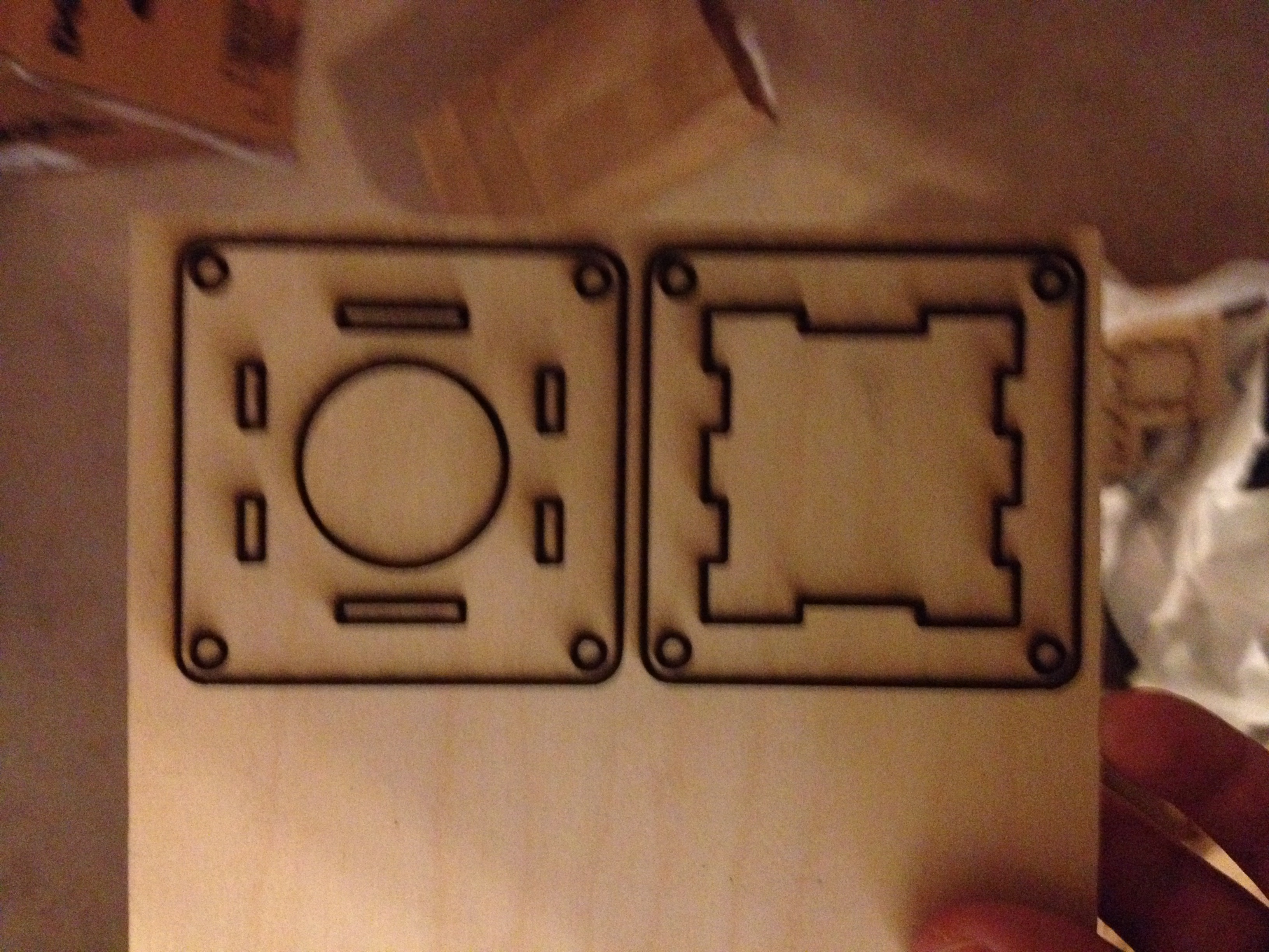 Cutting plywood parts on a laser cutter.  I made it at Techshop