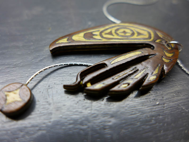 Laser Cut Raven Steals the Sun Necklace