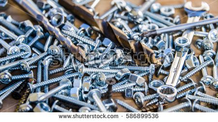 stock-photo-many-scattered-screws-one-of-them-screwed-into-the-wooden-plank-screws-macro-photo-screw-586899536.jpg