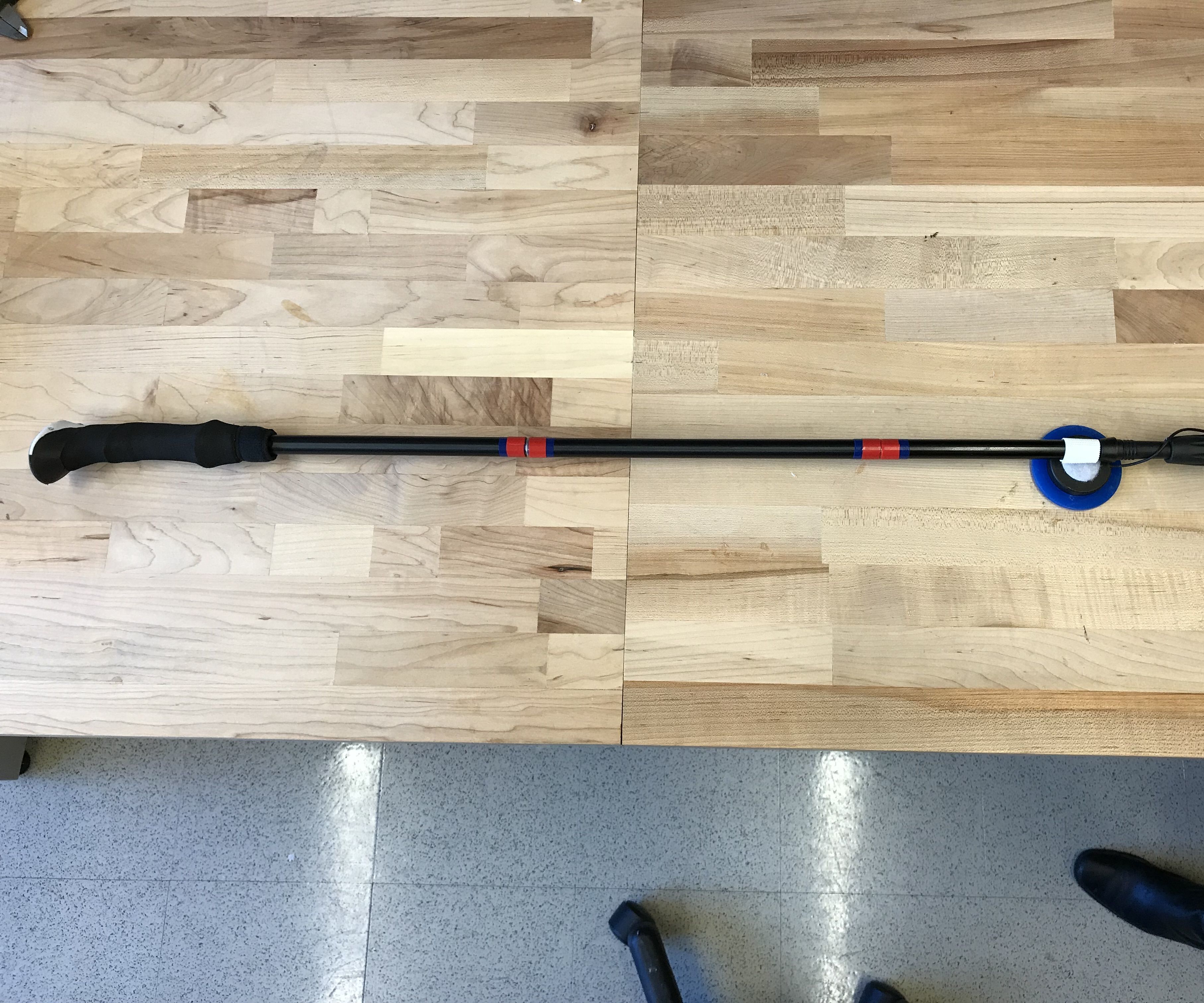 Assistive Technology Adhesive Picker Upper Device
