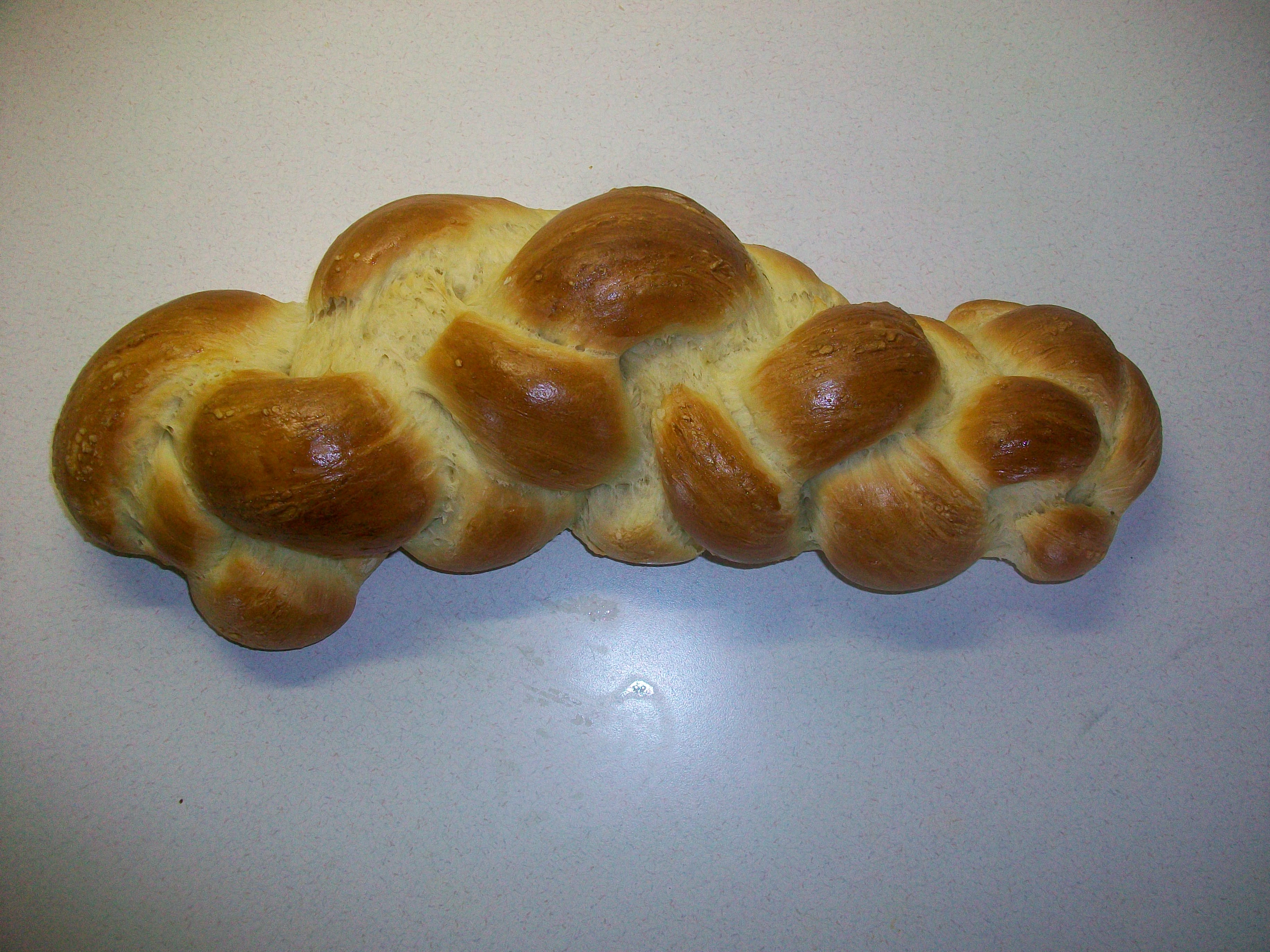 How to braid challah - 4 strand method.