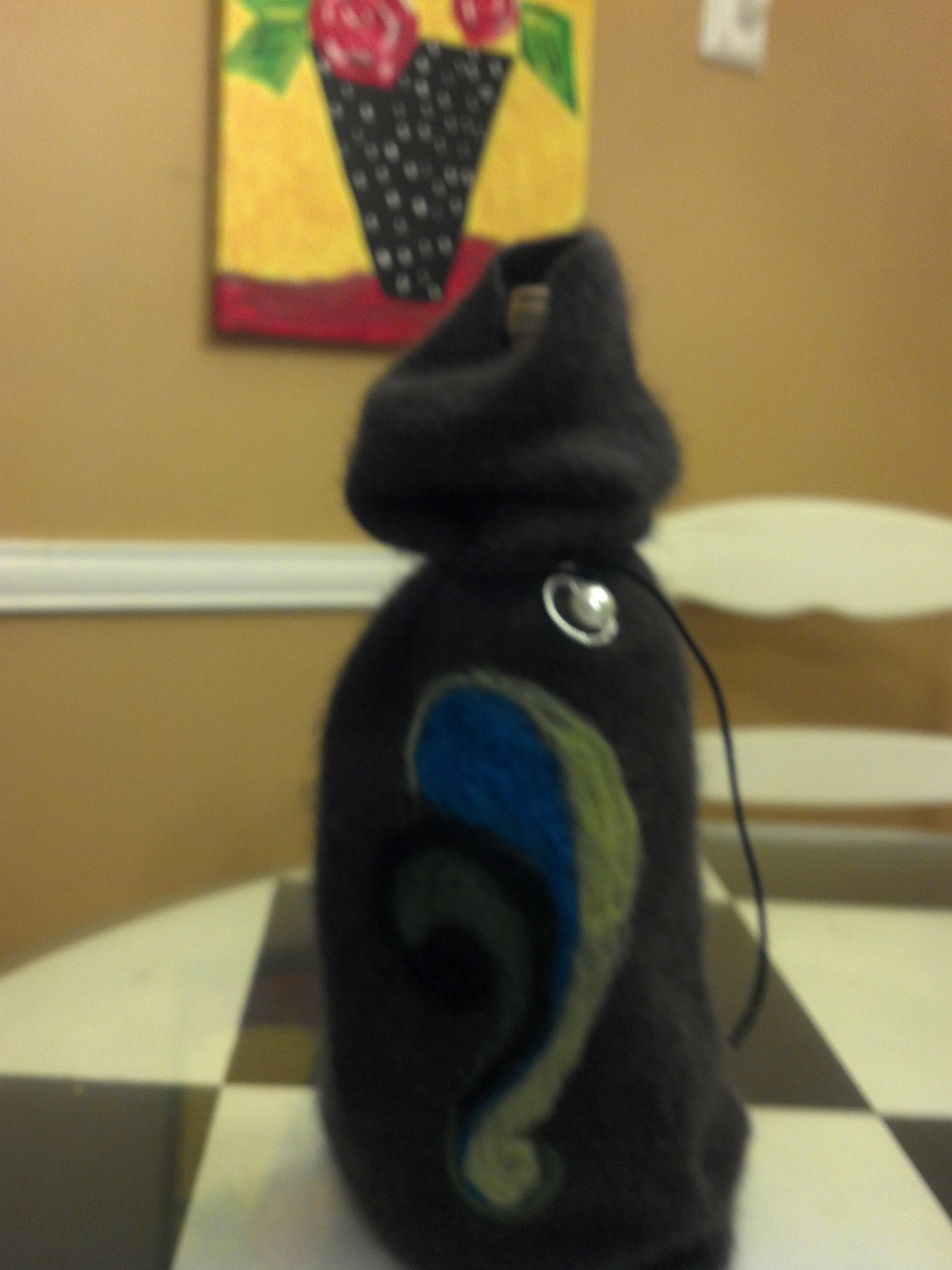 Upcycled pin fleted wine bottle cover