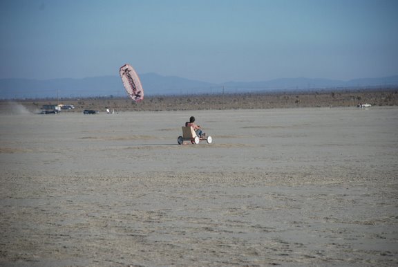 The kiteboogie:  keep your tush 7 inches off the ground and go way too fast